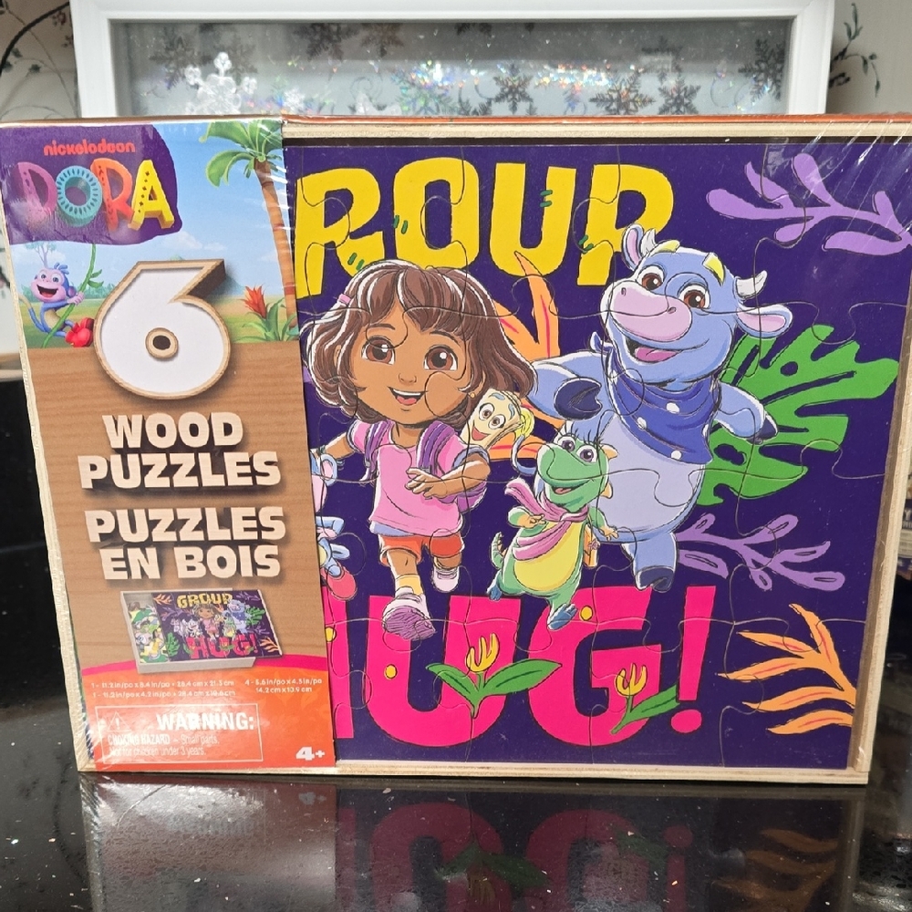 HOST PICK. NWT. Nickelodeon Dora 6 Wooden Puzzles And Wooden Holder